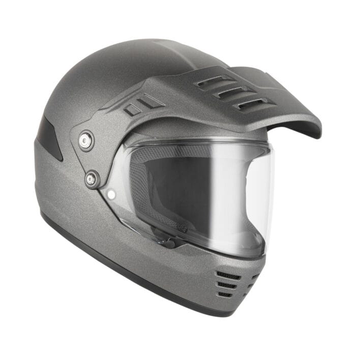 Casque moto intégral DUST titanium mat vue 3/4 avec visière trail amovible et écran large homologué ECE 22.06